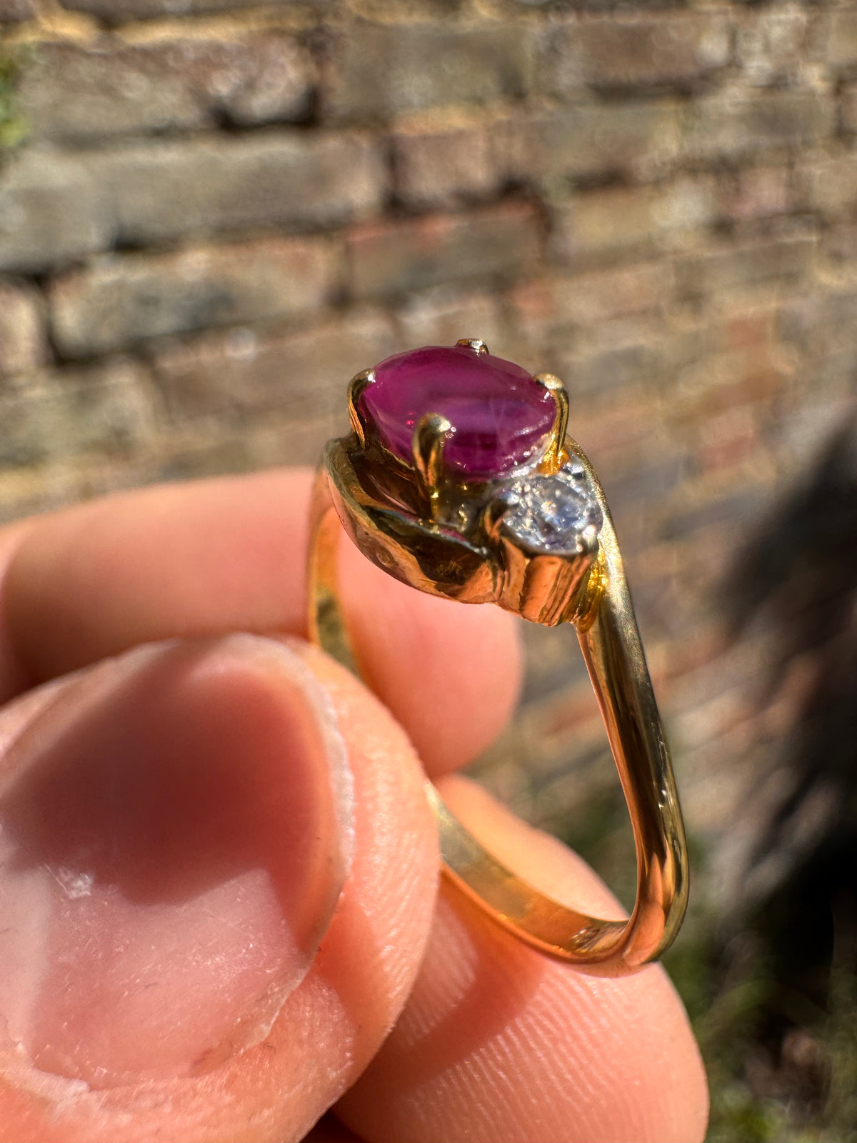 Lot 11: 18ct Yellow Gold Ruby Diamond Ring (Estimate £200-300)